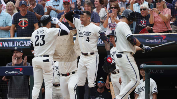 Oct 3, 2023; Minneapolis, Minnesota, USA; Minnesota Twins short stop Royce Lewis (23) celebrates with shortstop Carlos Correa after hitting a home run in the third inning against the Toronto Blue Jays during game one of the Wildcard series for the 2023 MLB playoffs at Target Field.